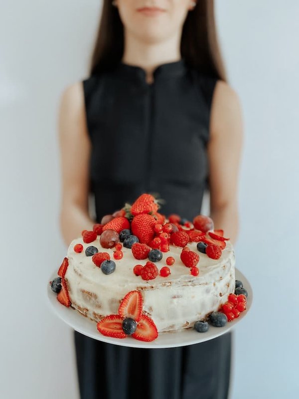 How to Bake a Moist Carrot Cake with Cream Cheese Frosting and Walnuts?