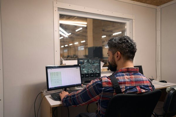 What methods are there to enhance air quality monitoring in UK's industrial areas?